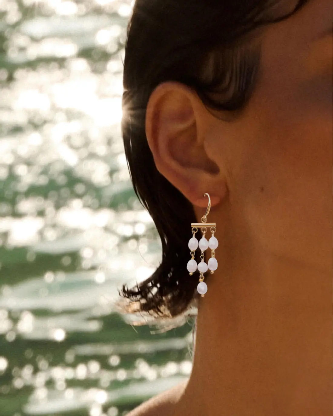 Aretes Vela con perlas de río en caída múltiple